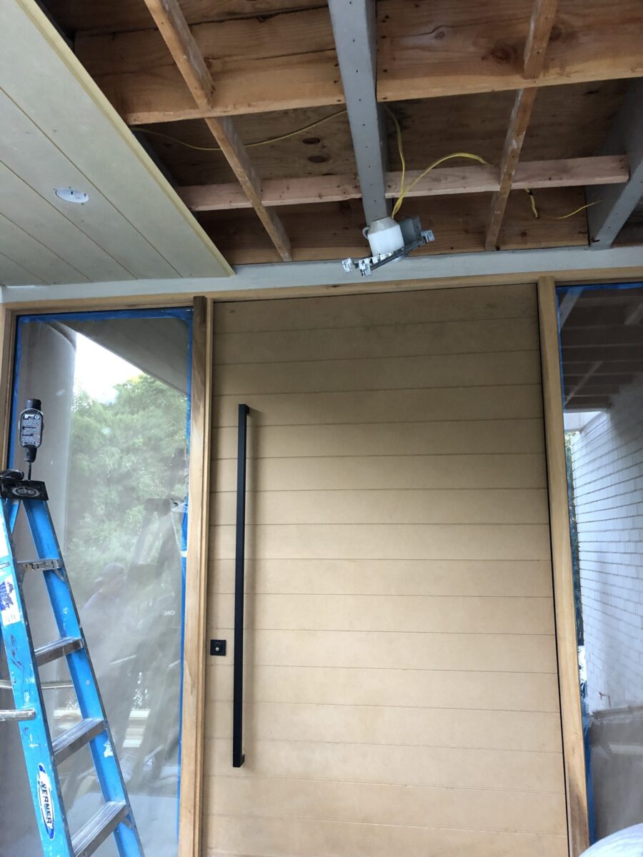 Partially renovated room with exposed ceiling and ladder. Partially renovated room with exposed ceiling and ladder.
